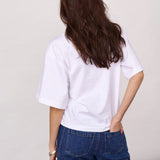 Model i hvid Co'Couture t-shirt set bagfra med løst snit