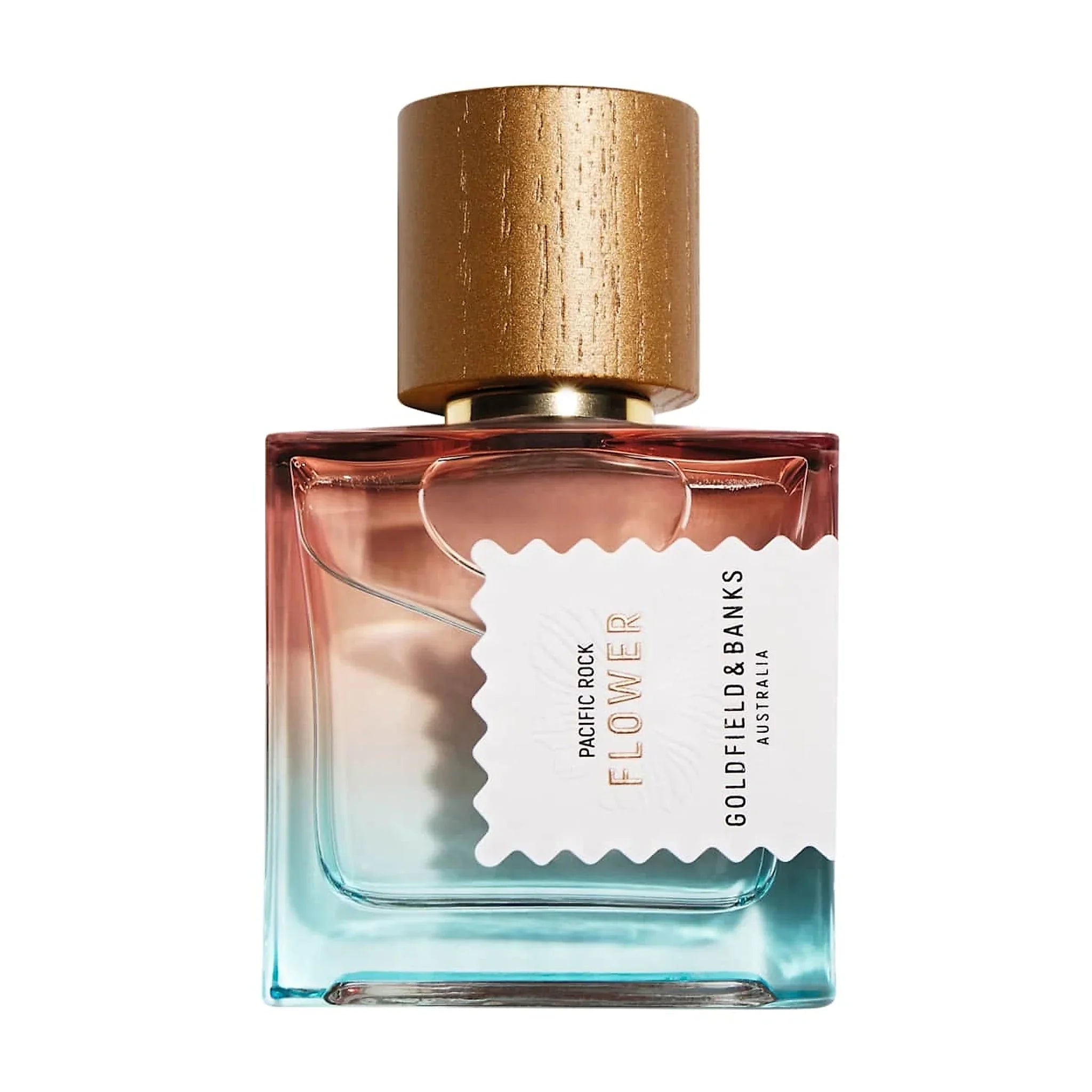 Pacific Rock Flower parfume fra Goldfield & Banks forfra i firkantet glasflaske fra rosa til turkis med guldfarvet låg