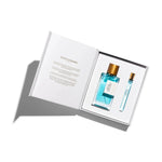 Åben hvid gaveæske set oppefra med Pacific Rock Moss parfume på 100 ml og rejsespray på 10 ml