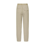 Beige Atalie Pants i Sand set bagfra med elastik i linningen og lomme med klap og strop