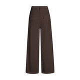 Brune wide leg bukser fra Gossia set bagfra med to baglommer, den ene med klap og strop