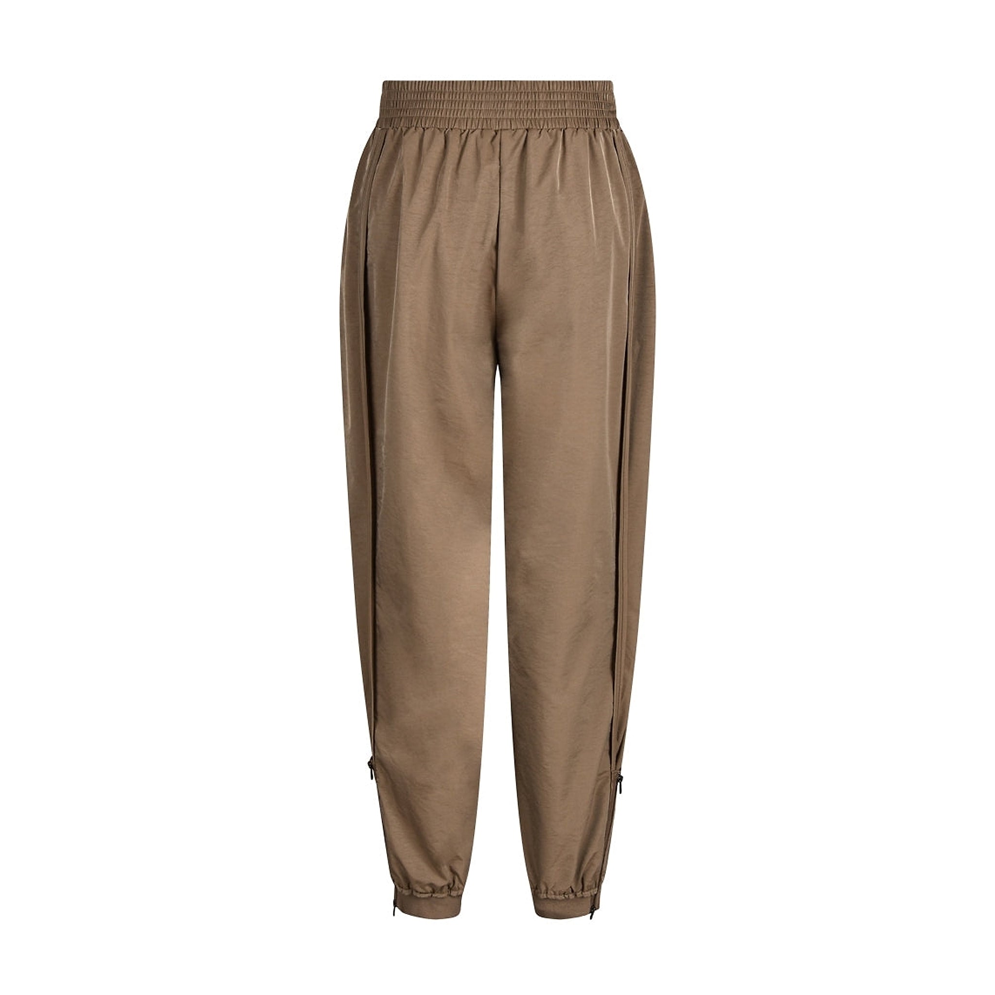 Brune bukser i Dark Camel bagfra med elastisk linning og små lynlåse i siden ved anklen