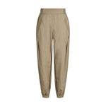 Beige bukser Mollie Pant i Light Camel fra Gossia set forfra med elastik i taljen, lommer og elastik ved anklen