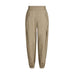 Beige bukser Mollie Pant i Light Camel fra Gossia set forfra med elastik i taljen, lommer og elastik ved anklen