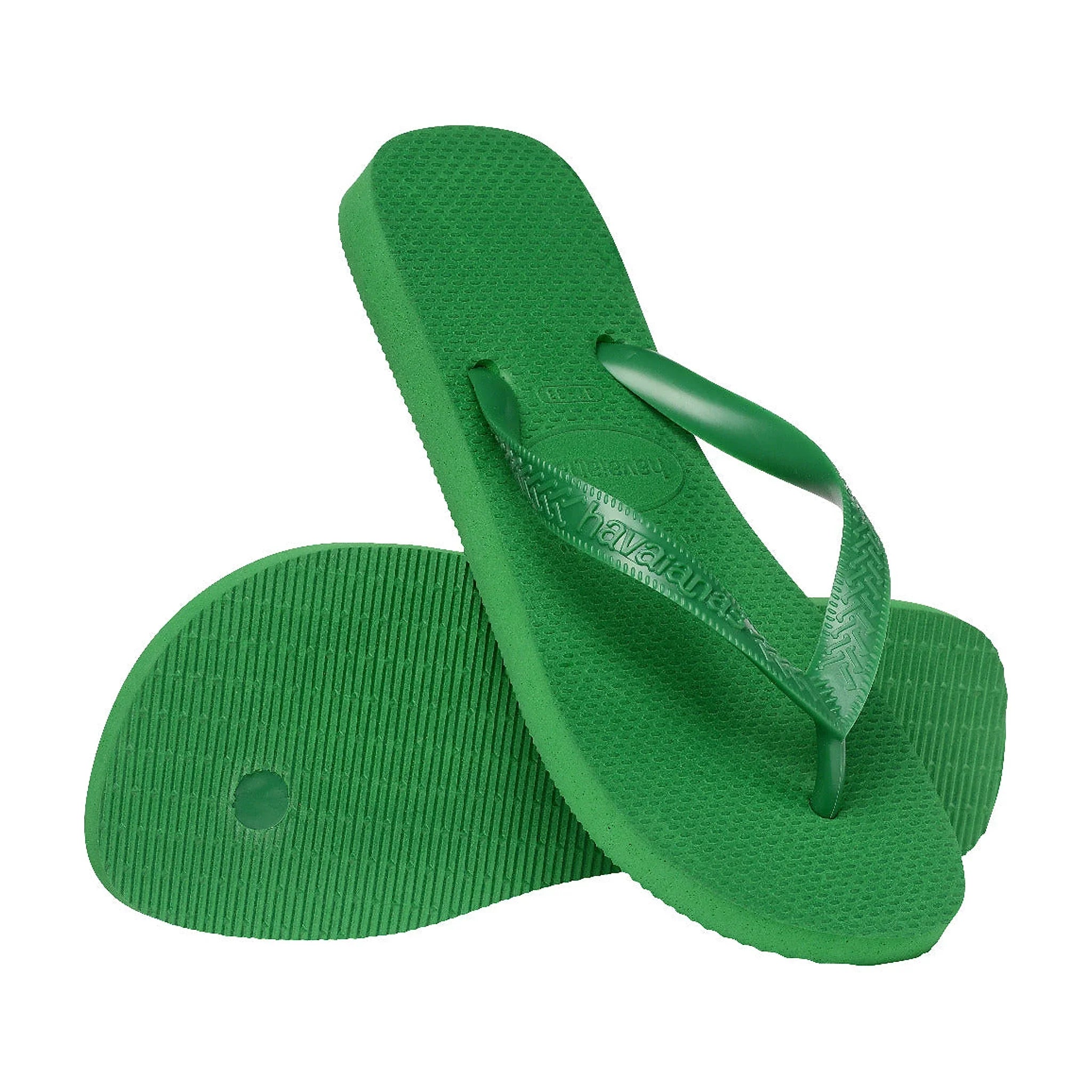 Par grønne Havaianas Top sandaler, hvor den ene viser undersålen med riller