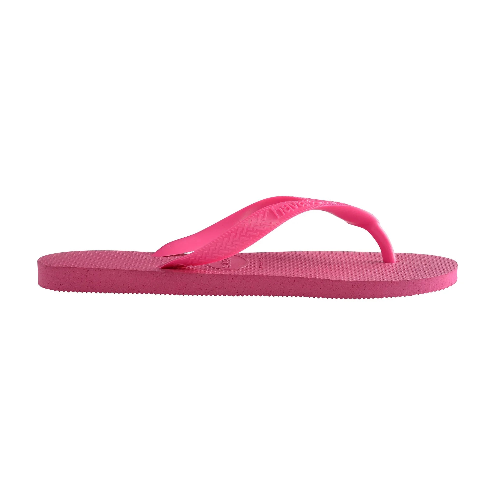 Pink flip-flop sandal fra Havaianas set fra siden med flad gummisål