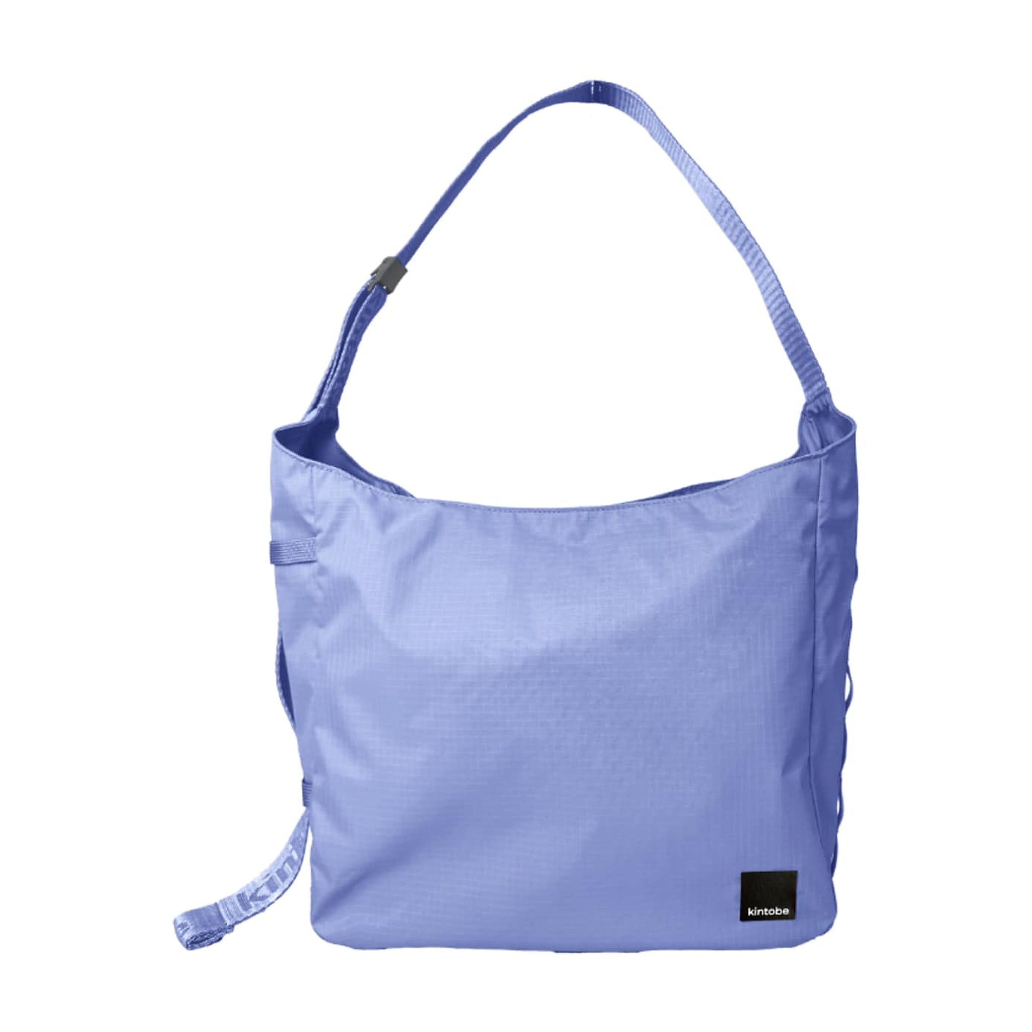 Blå Toby Bag taske fra Kintobe i nylon med skulderrem og sort logomærke, set forfra