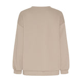 Beige Hibiscus sweatshirt set bagfra med ensfarvet ryg og ribkant ved ærmer og bund