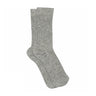 Grå ribstrikkede strømper Betty Socks fra MP Denmark med små sorte og hvide prikker, set fra siden