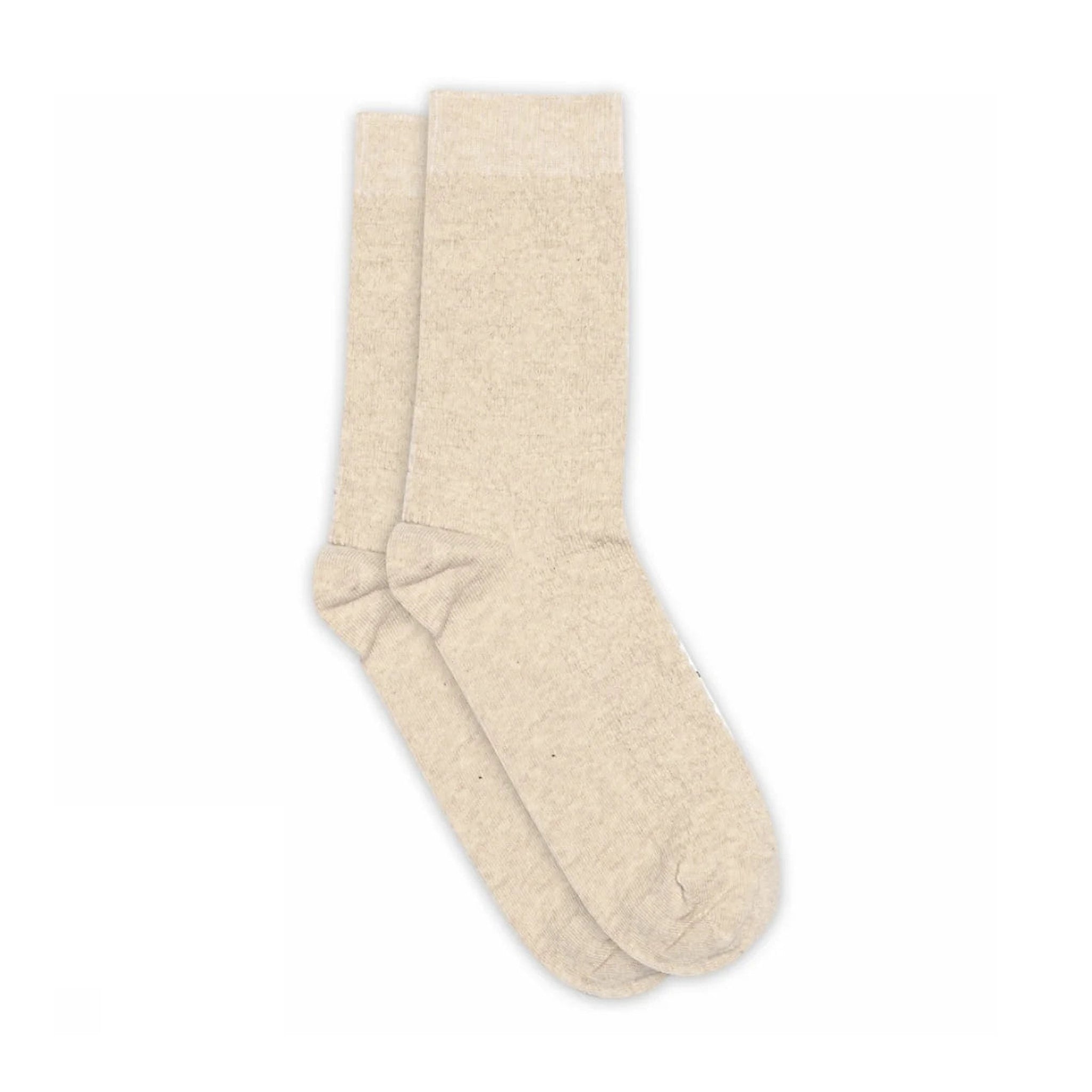 Et par beige strømper Lara Socks fra MP Denmark liggende fladt på hvid baggrund
