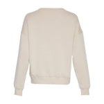 Beige sweatshirt Ima Q i Oatmeal fra MSCH Copenhagen set bagfra med nedfaldne skuldre og ribkant forneden