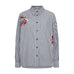 Stribet oversize skjorte i navy og hvid med broderede blomster og pailletter, set forfra