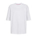 Hvid Nugira t-shirt fra Nümph set forfra med rund hals og lyserød blondekant i nakken