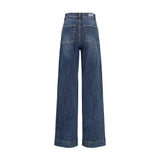 Blå wide leg jeans fra Nümph set bagfra med to baglommer og mærke på linningen