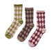 Flerfarvede Nümph strømper med argyle-mønster og glimmer i grøn og rosa, brun og bordeaux med rosa, liggende side om side