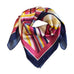 Pink tørklæde Bandito Scarf i Fandango Pink med striber og mørkeblå kant, bundet i en knude på grå baggrund