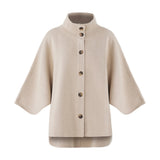 Beige strik Birdie Knit fra OneTwo Luxzuz forfra med høj hals, vide ærmer og knapper foran
