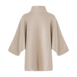 Beige strik Birdie Knit fra OneTwo Luxzuz set bagfra med poncho-inspireret silhuet og høj hals