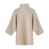 Beige strik Birdie Knit fra OneTwo Luxzuz set bagfra med poncho-inspireret silhuet og høj hals