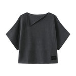 Grå Zakia strik fra OneTwo Luxzuz med korte, brede ærmer set forfra på hvid baggrund