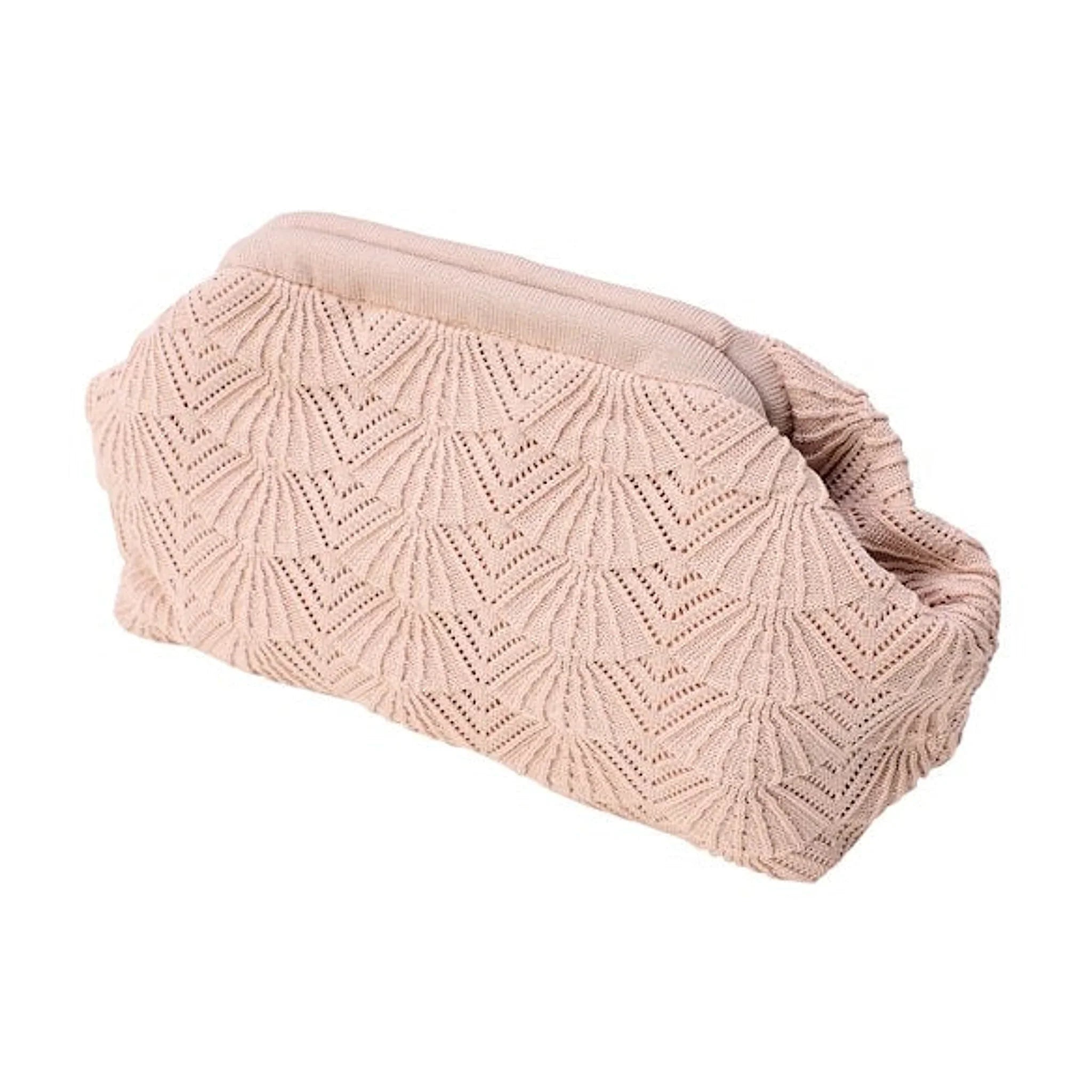 Pink Shelly Clutch fra Pico i Oyster Pink med muslingeinspireret mønster, lukket og set skråt fra siden