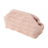 Pink Shelly Clutch fra Pico i Oyster Pink med muslingeinspireret mønster, lukket og set skråt fra siden