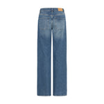 Blå wide leg jeans fra Pulz set bagfra med to baglommer og brunt mærke