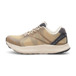 Beige sneakers fra Woden i farven Desert set fra siden med mesh-overdel og lys sål