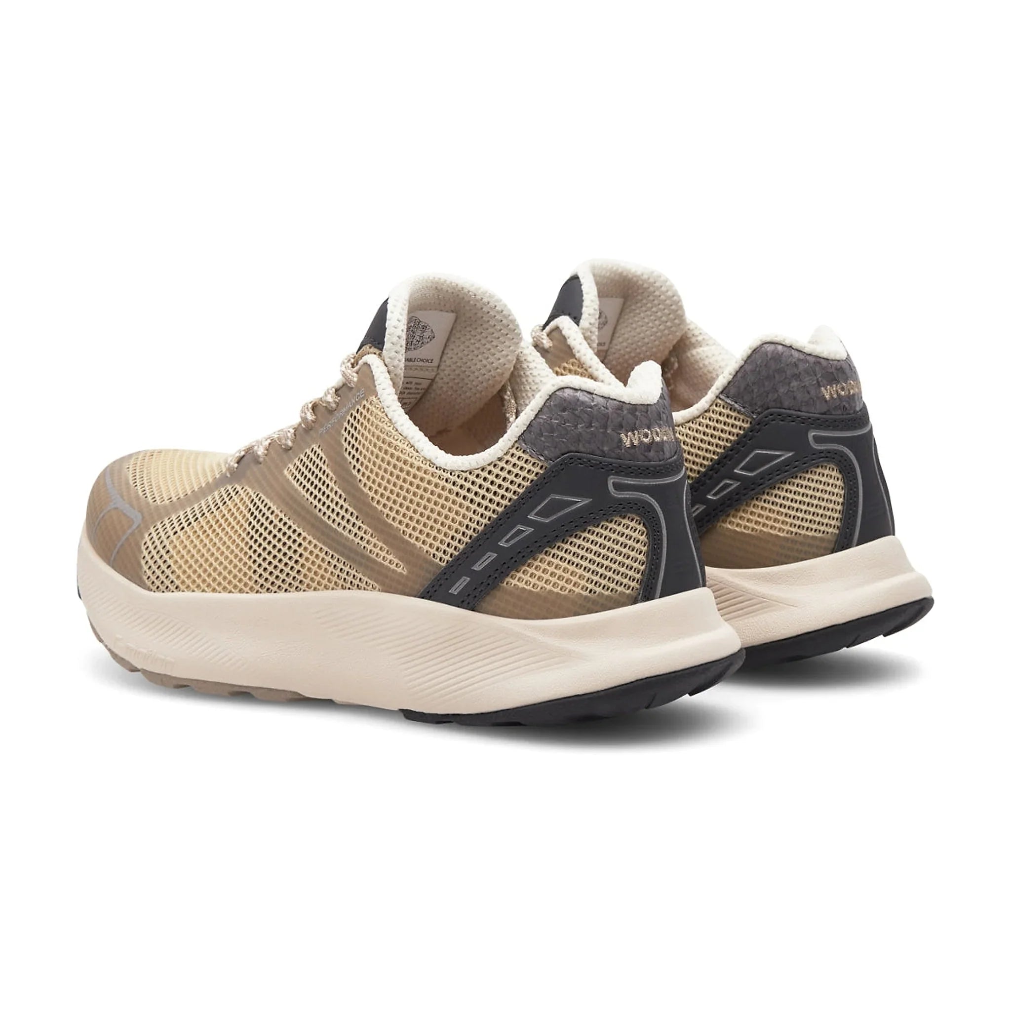Beige Woden sneakers set skråt bagfra med mørkegrå detaljer ved hælen