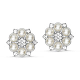 To hvide button covers Big Pearl Flower fra Wolff Jewelry med perler og klare sten i sølvfarvet blomst, set forfra