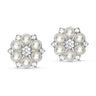 To hvide button covers Big Pearl Flower fra Wolff Jewelry med perler og klare sten i sølvfarvet blomst, set forfra