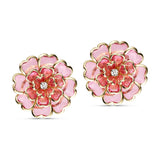 To pink button covers formet som store blomster med hjerteformede kronblade, guldfarvede kanter og hvid sten