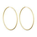 Store, tynde guld øreringe Classic Hoops 50mm fra Wolff Jewelry set forfra på lys baggrund