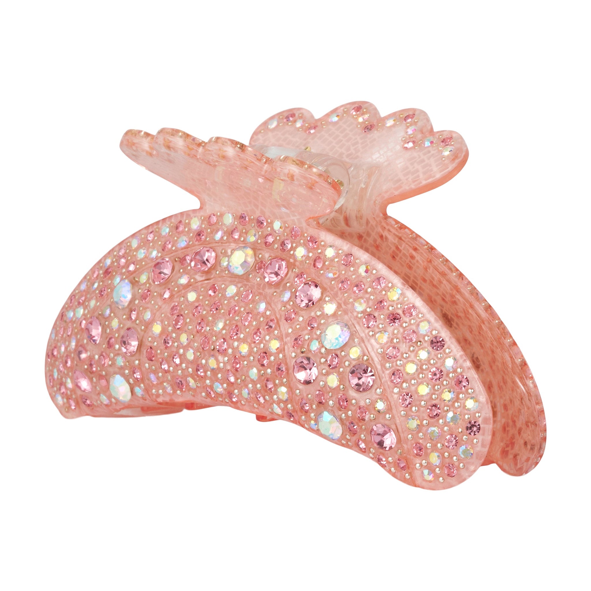 Pink hårklemme fra Wolff Jewelry med lyserøde og regnbueskinnende sten og bølget kant, set fra siden