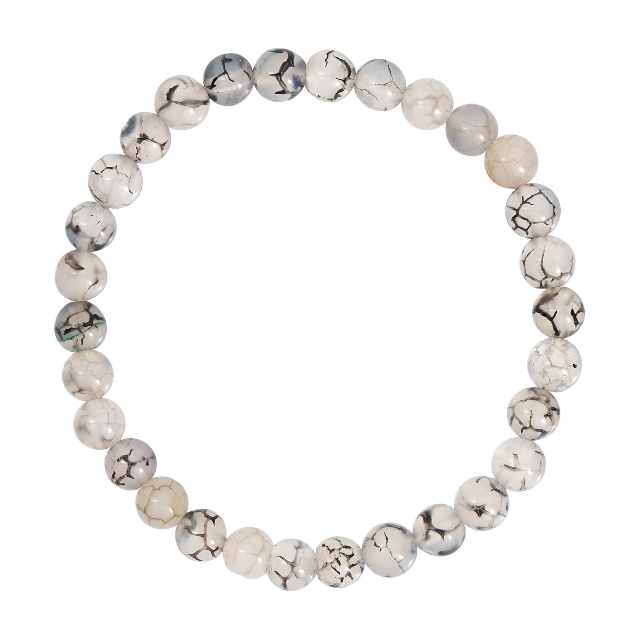 Gråt elastisk armbånd fra Wolff Jewelry med lyse, runde stenperler med sorte streger, set ovenfra på hvid baggrund