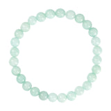 Mintgrønt elastisk armbånd med runde naturlige stenperler fra Wolff Jewelry set ovenfra på hvid baggrund
