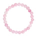 Pink elastisk armbånd Jalle Pearl Bracelet i Rose med runde lyserøde stenperler set ovenfra