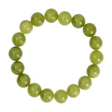 Grønt armbånd Jusi Pearl Bracelet fra Wolff Jewelry med runde, blanke olivengrønne perler af natursten, set ovenfra