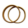 To guldfarvede sleeve holders fra Wolff Jewelry med riflet spiralstruktur lagt over hinanden på hvid baggrund