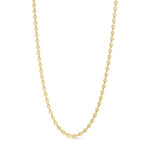Sunny Chain Necklace halskæde i guld fra Wolff Jewelry med små runde led med strålemønster på lys baggrund