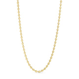 Sunny Chain Necklace halskæde i guld fra Wolff Jewelry med små runde led med strålemønster på lys baggrund